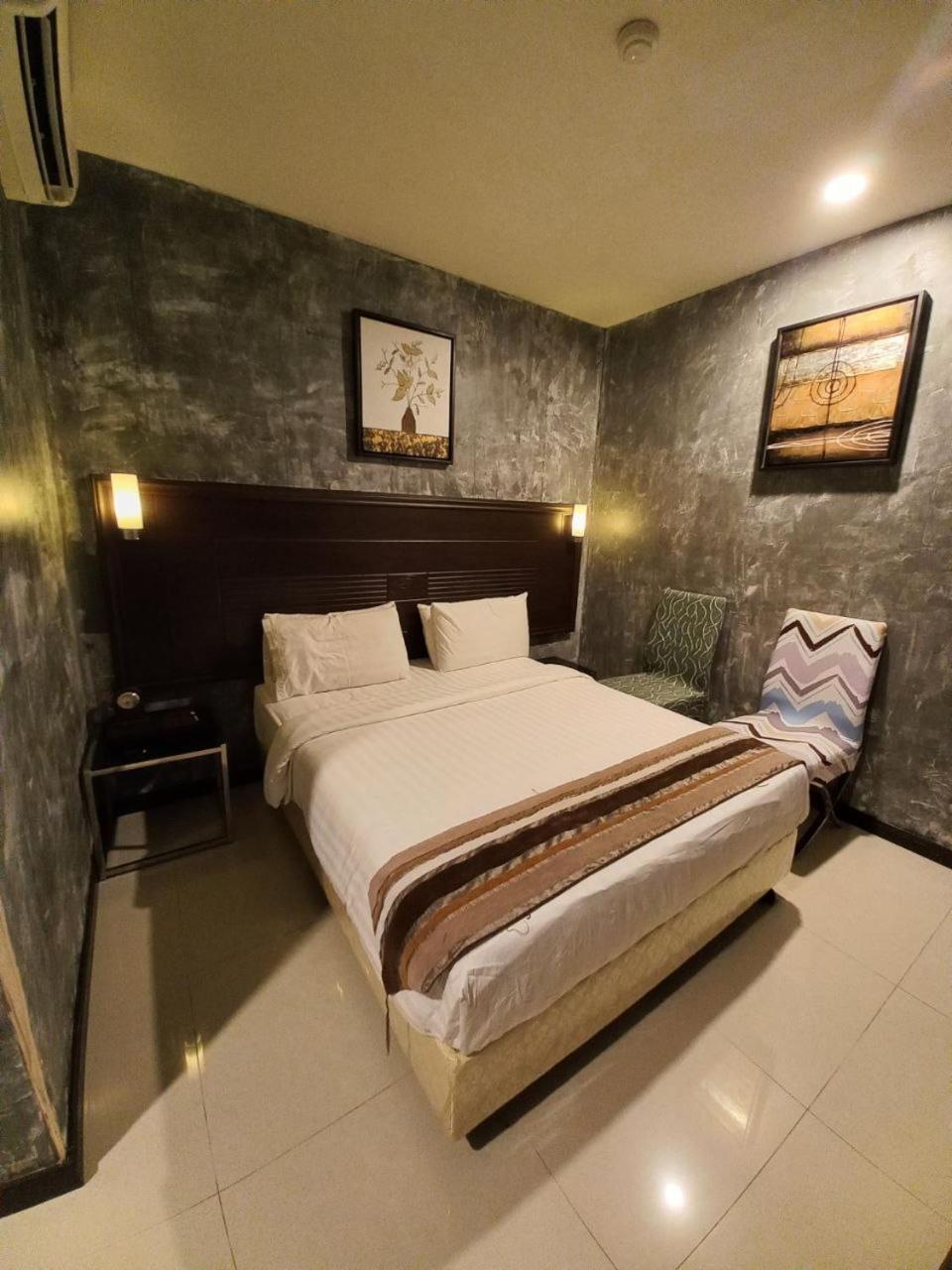 GM Hotel Changlun Buitenkant foto