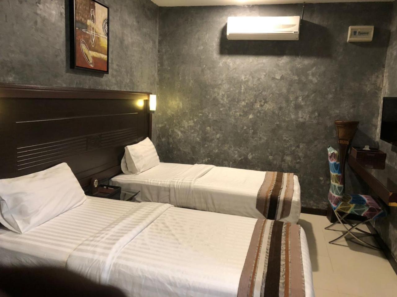 GM Hotel Changlun Buitenkant foto