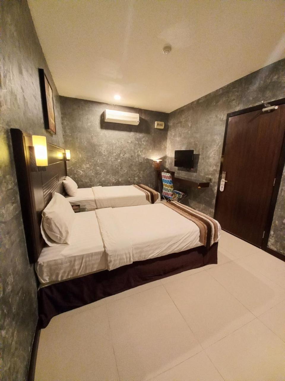 GM Hotel Changlun Buitenkant foto