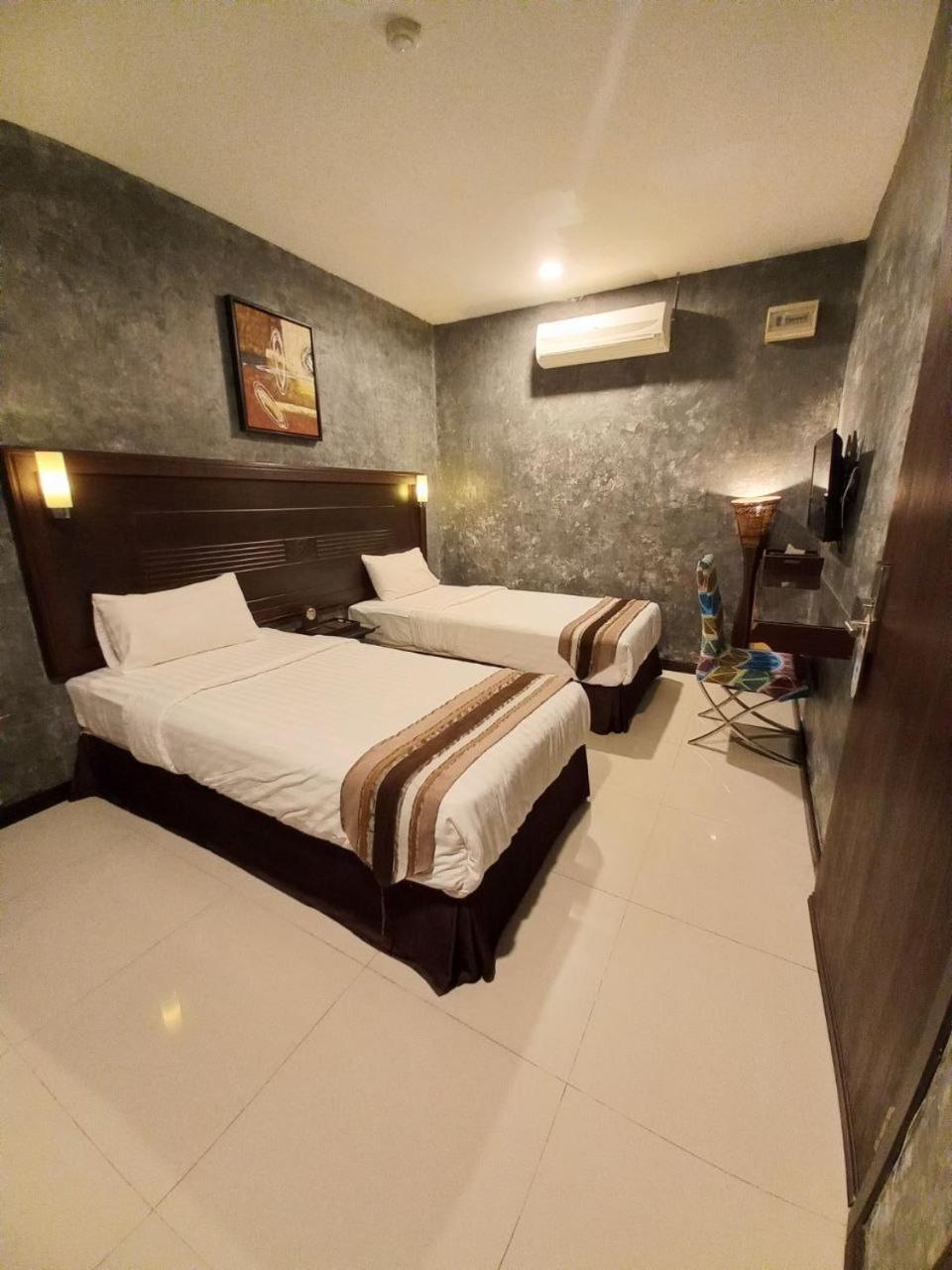 GM Hotel Changlun Buitenkant foto