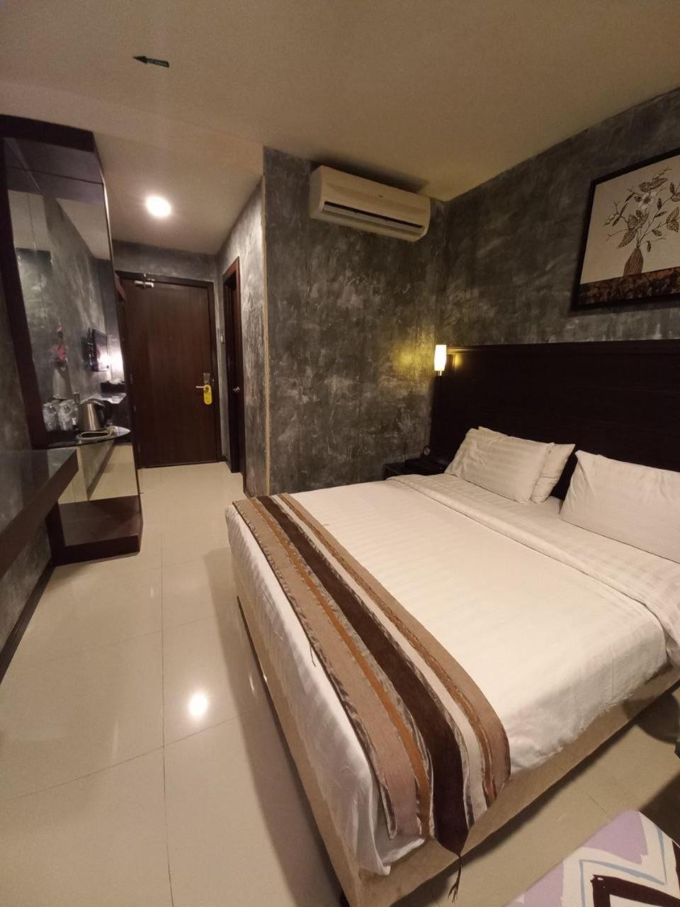GM Hotel Changlun Buitenkant foto